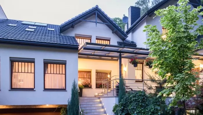 Modern home with lights on