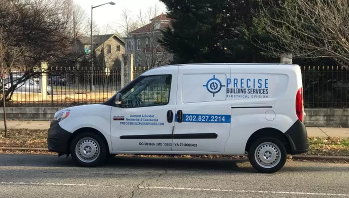 precise building services truck on street