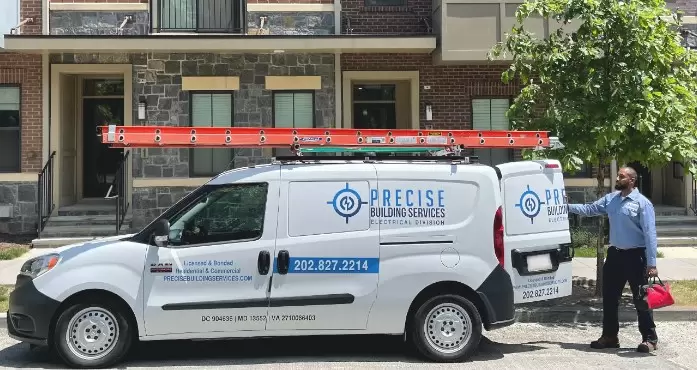 Precise building services van with technician